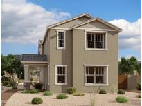Charming two-story home with tan stucco, decorative roofline, and welcoming covered porch at 1913 W Lariat Ln, Phoenix, AZ 85085