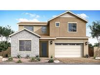 Charming two-story home featuring a stacked stone accent wall and a two-car garage at 1450 E Prescott St, Gilbert, AZ 85298