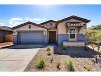 Charming single-Gathering home with a two-car garage and low-maintenance landscaping at 31345 N 130Th Ave, Peoria, AZ 85383