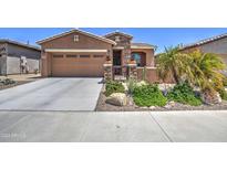 Charming single-Gathering home with a two-car garage, desert landscaping, and gated courtyard at 16781 S 181St Ln, Goodyear, AZ 85338