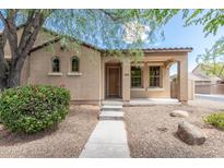 Charming single-story home with a well-maintained front yard and welcoming entrance at 1867 S Seton Ave, Gilbert, AZ 85295