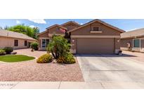 Charming single-story home with a well-maintained desert landscaped front yard and a two-car garage at 3793 E Lexington Ave, Gilbert, AZ 85234