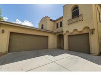 Charming home featuring a spacious three-car garage and traditional design at 5425 W Harwell Rd, Laveen, AZ 85339