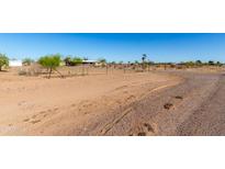 Ranch-style home with desert landscaping, featuring a cozy porch and spacious yard at 3747 S Mammoth Dr, Casa Grande, AZ 85193