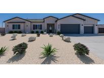 Inviting single-story home featuring desert landscaping, multiple-car garage, and neutral color palette at 6579 W Apex Ave, Queen Creek, AZ 85144