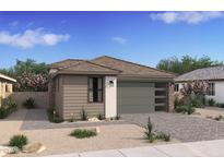 Charming single-story home featuring a modern garage door, desert landscaping, and a stone-accented facade at 20332 W Sells Dr, Buckeye, AZ 85396