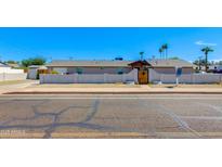 Charming home featuring a unique gated courtyard and well-maintained front yard with a clean and inviting street view at 3601 N 12Th St, Phoenix, AZ 85014