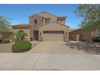 Charming two-story home featuring a stone accent wall and a spacious two-car garage at 2784 E Honeysuckle Pl, Chandler, AZ 85286