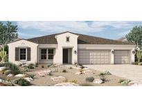 Beautiful single-story home with neutral stucco, three-car garage, desert landscaping and brown roof in Arizona at 980 W Ridge Rd, Apache Junction, AZ 85120