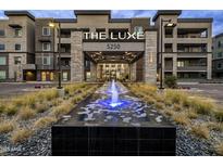 Stunning exterior of The Luxe community featuring a water feature at the main entrance at 5250 E Deer Valley Dr # 440, Phoenix, AZ 85054