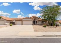 Inviting single-story home featuring a two-car garage and desert landscaping at 19029 N 36Th St, Phoenix, AZ 85050