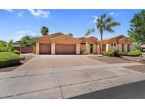Spacious house with three garages and desert landscaping at 4204 S Winter Ln, Gilbert, AZ 85297