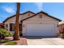 Charming single-story home featuring a two-car garage and well-maintained landscaping at 1279 N Blackstone Dr, Chandler, AZ 85224