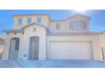 Charming two-story home with a neutral color scheme and a two car garage at 7425 W Crown King Rd, Phoenix, AZ 85043