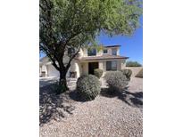 Charming two-story home featuring desert landscaping and a light exterior paint scheme at 1794 N Agave St, Casa Grande, AZ 85122