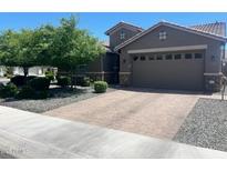 Charming single-Gathering home with a well-manicured lawn and a spacious two-car garage at 18731 W San Juan Ave, Litchfield Park, AZ 85340