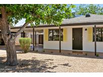 Charming single-story home with desert landscaping, covered entry and ADT security system at 3115 N 34Th Pl, Phoenix, AZ 85018