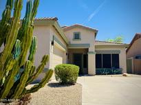 Charming single-story home featuring desert landscaping, a tile roof, and a well-maintained front yard at 7111 S 21St Dr, Phoenix, AZ 85041