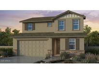 Charming two-story home featuring stone accents, a two-car garage, and a cozy covered front porch at 4064 E Ghost Flower Ln, San Tan Valley, AZ 85140