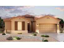 Charming single-story home with a desert landscape and a spacious two-car garage at 18909 W Mclellan Rd, Waddell, AZ 85355