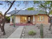 Charming brick bungalow with a welcoming front porch and desert landscaping at 2534 N 10Th St, Phoenix, AZ 85006