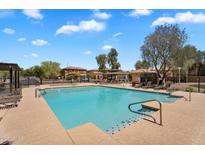 Sparkling community pool with lounge seating, perfect for relaxation and enjoyment at 6469 W Ruth Ave, Glendale, AZ 85302