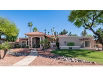 Inviting single-Gathering home featuring a tile roof, stucco exterior, and well-manicured desert landscaping at 1739 E Knox Rd, Tempe, AZ 85284