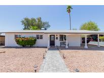 Charming single-story home with a walkway, desert landscaping, and a covered porch at 808 N 78Th St, Scottsdale, AZ 85257