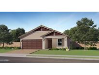 Charming single-Gathering home with a symmetrical design, paired garage and well-kept lawn at 23356 W Atlanta Ave, Buckeye, AZ 85326