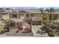 Charming home with a tile roof, desert landscaping, a two-car garage, and a sunny sky at 4305 S Antonio --, Mesa, AZ 85212