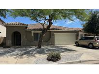 Charming single-story home with a well-maintained yard and inviting curb appeal in a sunny neighborhood at 6421 S 23Rd Dr, Phoenix, AZ 85041