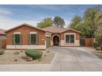 Charming single-story home with a well-maintained yard and inviting curb appeal at 15140 W Glenrosa Ave, Goodyear, AZ 85395