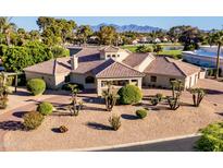 Stunning single story home with desert landscaping, tile roof, and mountain views in a golf course community at 14123 W Greentree S Dr, Litchfield Park, AZ 85340