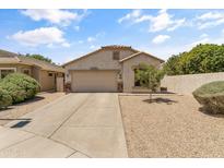 Charming single-story home featuring desert landscaping, a two-car garage, and a welcoming entrance at 812 S Fern Ct, Gilbert, AZ 85296