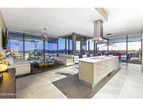 Open-concept living space featuring modern furnishings and panoramic city views at 7180 E Kierland Blvd # 1218, Scottsdale, AZ 85254