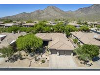 Expansive desert home with a three-car garage and stunning mountain views at 11088 E Acacia Dr, Scottsdale, AZ 85255