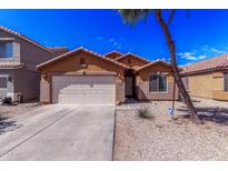 Charming single-story home featuring a two-car garage and desert landscaping in a quiet neighborhood at 36480 W El Greco St, Maricopa, AZ 85138