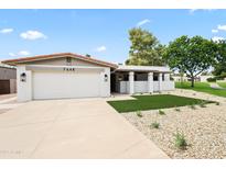 Charming single-story home featuring a two-car garage and well-maintained desert landscaping at 7648 N Via Del Paraiso --, Scottsdale, AZ 85258