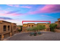 Close exterior view of homes showcases classic architecture with a backdrop of mountains and a colorful sky at 7199 E Ridgeview Pl # 221, Carefree, AZ 85377