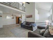 Cozy living room features neutral tones, comfortable seating, and a stylish loft area at 154 W 5Th St # 212, Tempe, AZ 85281