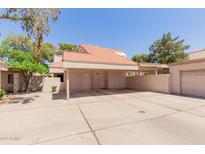 Charming single-story home with a terracotta tile roof and neutral-colored stucco exterior at 6350 N 78Th St # 280, Scottsdale, AZ 85250