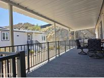 Spacious covered patio with comfortable seating, perfect for outdoor living at 2233 E Behrend Dr # 211, Phoenix, AZ 85024