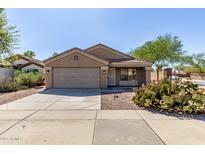 Attractive single-Gathering home with a two car garage and desert landscaping on a clear, sunny day at 3532 S 160Th Ln, Goodyear, AZ 85338