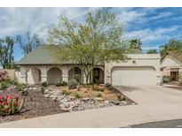 Charming single-story home with desert landscaping and a two-car garage in a quiet neighborhood at 620 N Entrada St, Chandler, AZ 85226