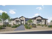 Charming single-story home featuring stone accents, a tiled roof, desert landscaping, and a welcoming entrance at 11140 W Prospector Dr, Queen Creek, AZ 85144