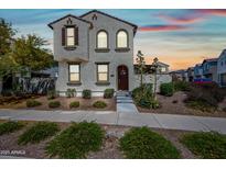 Charming two-story home featuring desert landscaping and a welcoming front entrance at 20812 W Legend Trl, Buckeye, AZ 85396