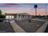 Charming single story home featuring well-maintained landscaping and classic desert appeal at 3160 E Main St # 110, Mesa, AZ 85213