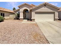 Charming single-story home with a two-car garage, low maintenance landscaping, and a classic Southwestern design at 4626 E Villa Rita Dr, Phoenix, AZ 85032