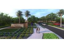 Welcome to the Fulton Homes Prasada community, with lush landscaping, sidewalks, and a parkway at 15620 W Georgia Dr, Surprise, AZ 85379