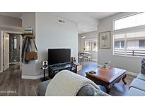 Spacious living room with contemporary decor and an open layout, great for entertaining at 4343 N 21St St # 213, Phoenix, AZ 85016